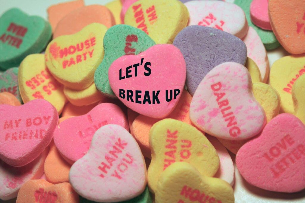 Colorful Heart-Shaped Candy Wallpaper: Love & Heartbreak Design