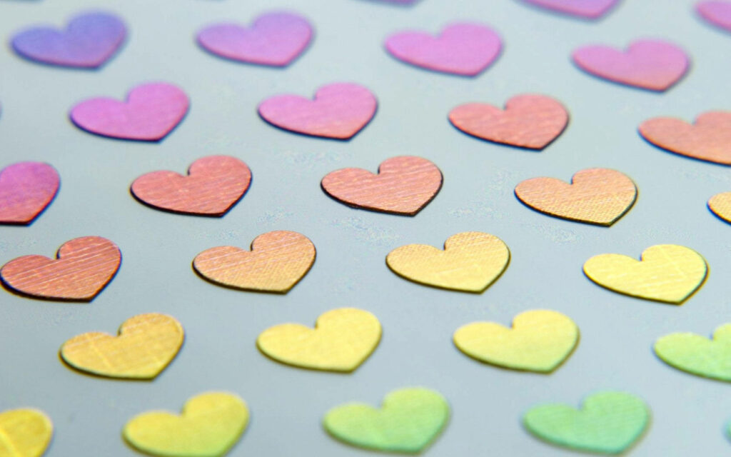 Colorful Heart Wallpaper: Vibrant Pattern on Light Background