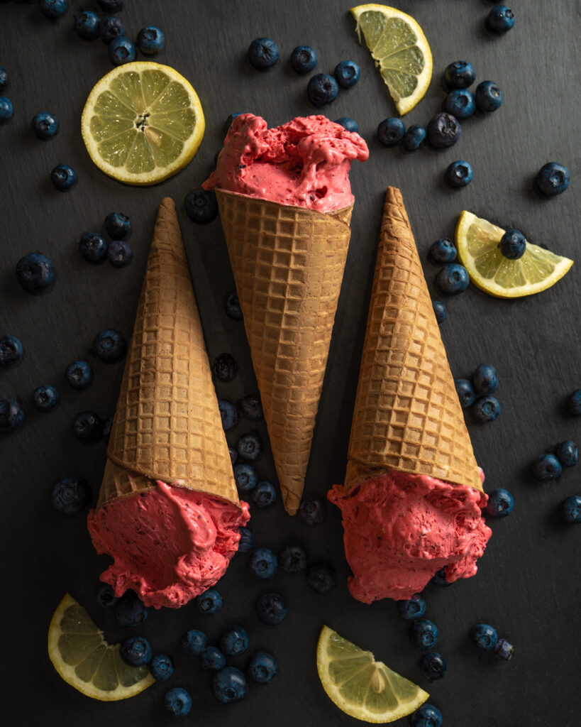 Colorful Ice Cream Waffle Cones Wallpaper with Blueberries & Lemons