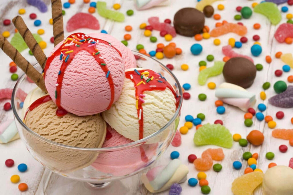 Colorful Ice Cream Wallpaper with Sprinkles and Candy Treats