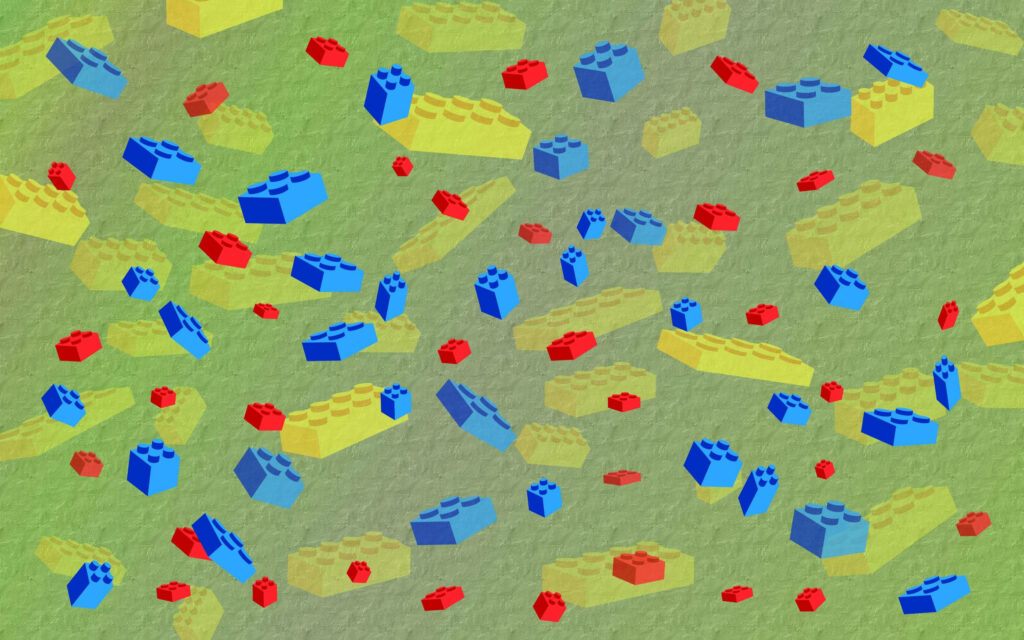 Colorful Lego bricks scattered on textured background vibrant red yellow blue playful wallpaper