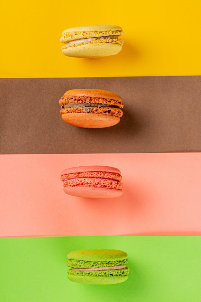Vibrant Wallpaper of Colorful Macarons on Bright Backgrounds