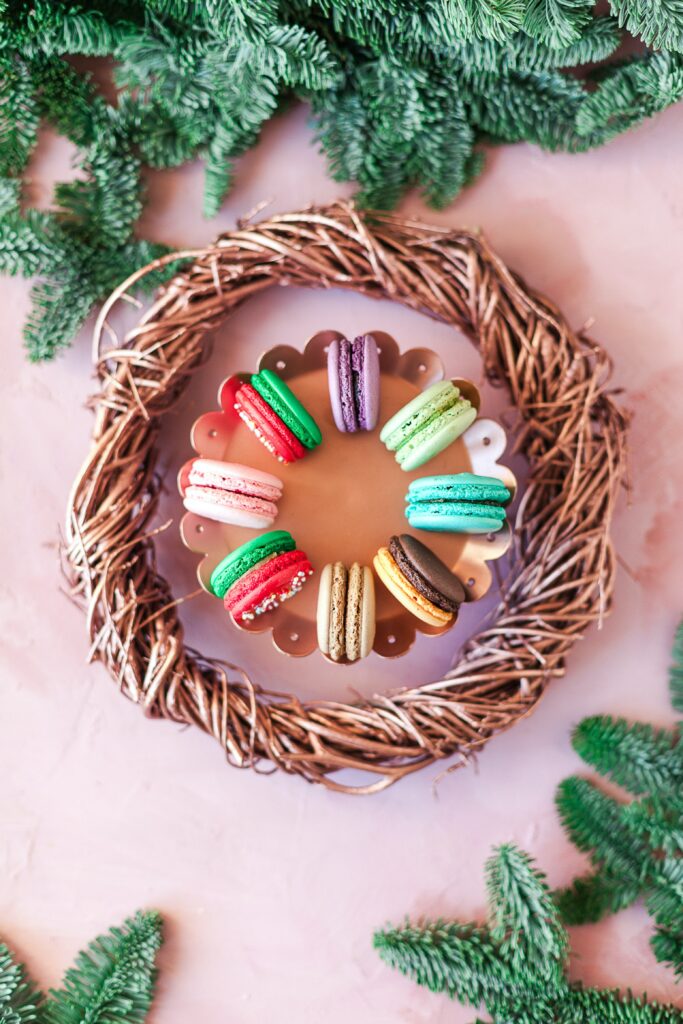 Colorful Macarons & Cookies Wallpaper: Festive Plate & Greenery