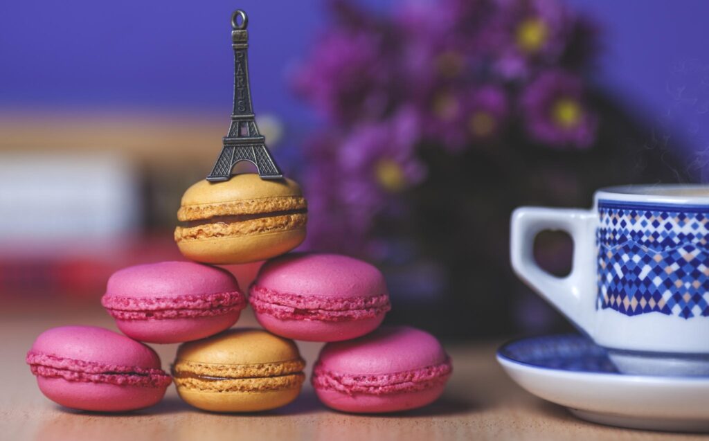 Colorful Macarons Pyramid with Eiffel Tower - Floral Wallpaper Background