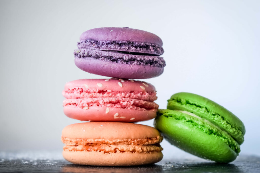 Vibrant Macarons Wallpaper: Colorful Dessert Delight Background