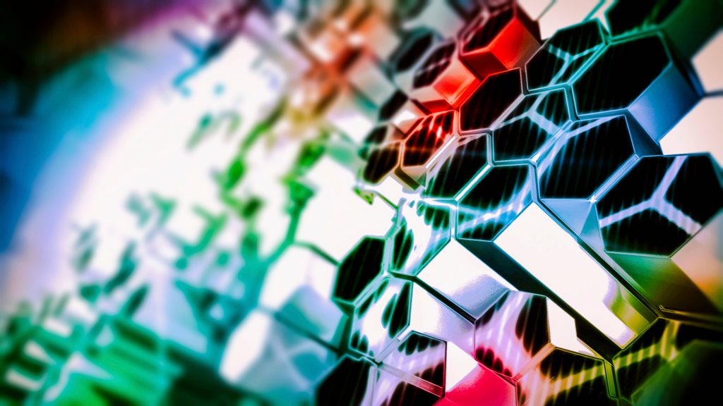 Colourful 3D metal hexagon tubes wallpaper with vibrant red blue green glossy honeycomb design