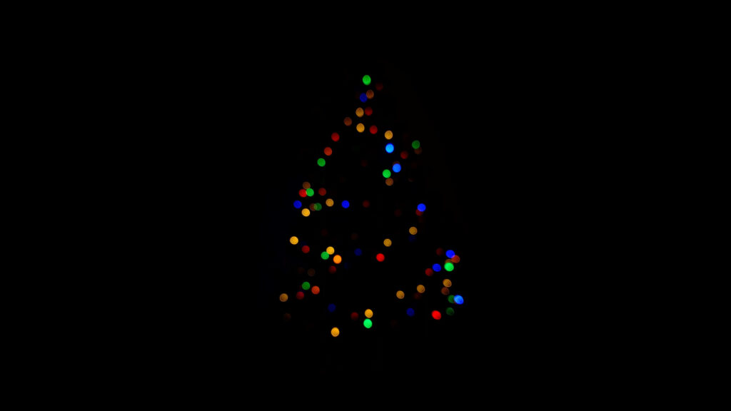 Colorful Minimalist Christmas Tree Wallpaper on Black Background