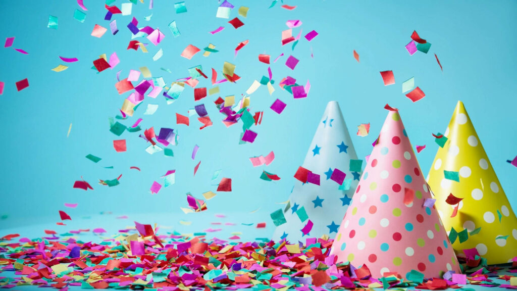 Festive Party Hat Wallpaper: Colorful Dots & Stars on Blue Background