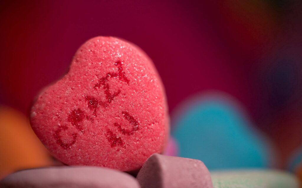 Vibrant Heart-Shaped Candy Wallpaper: Crazy 4U Design & Pastels