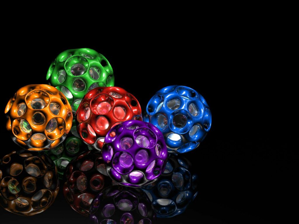Colorful Perforated Spheres Wallpaper - Dramatic Black Background
