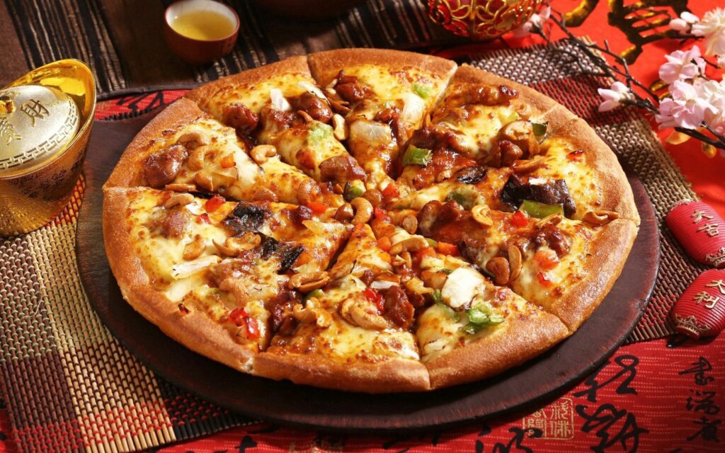 Mouthwatering Pizza Wallpaper with Colorful Ingredients & Vibrant Background
