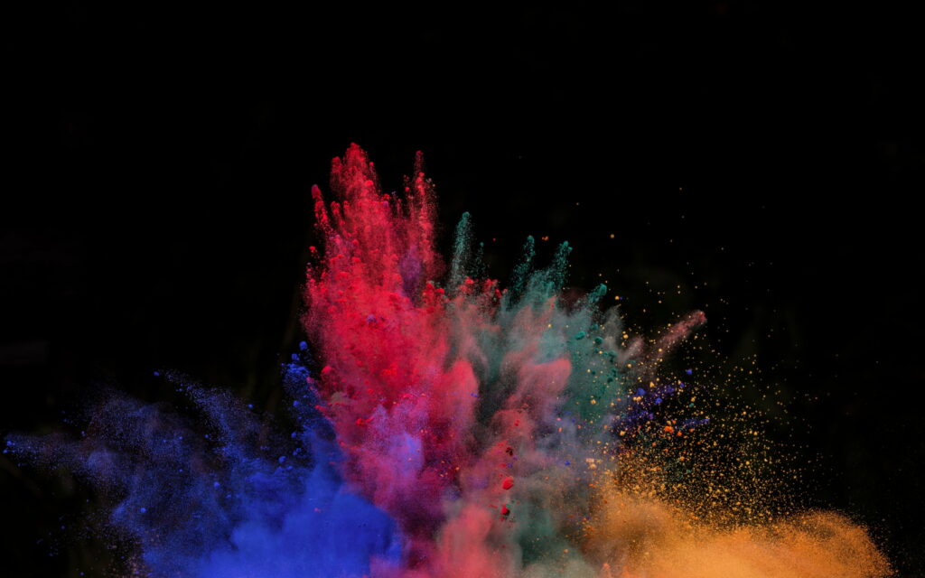 Vibrant Burst: Captivating HD Wallpaper of a Colorful Powder Explosion