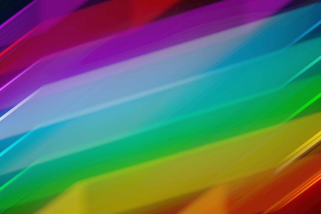 Vibrant diagonal rainbow stripes digital wallpaper with glowing smooth lines in abstract design