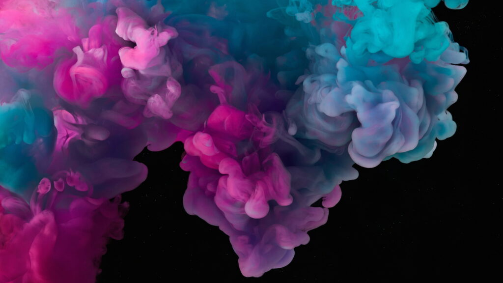 4K abstract wallpaper vibrant pink and blue ink swirls on black background modern desktop mobile