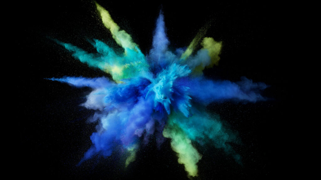 Vibrant colorful smoke explosion wallpaper in electric blue teal lime green on black background