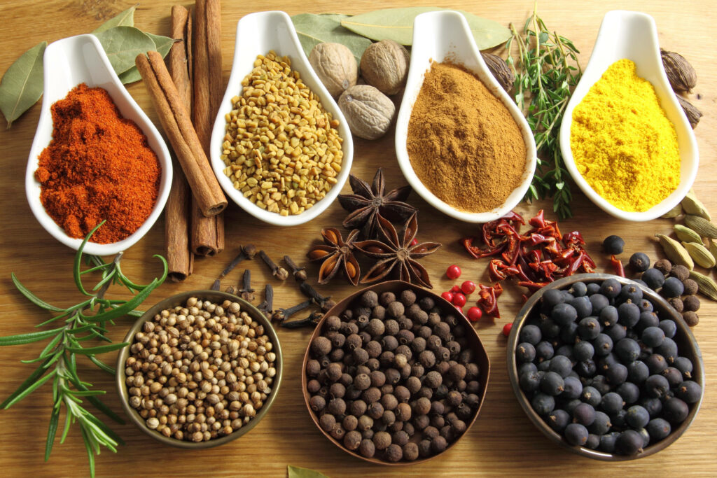 Vibrant Spice and Herb Wallpaper: Colorful Culinary Display Background