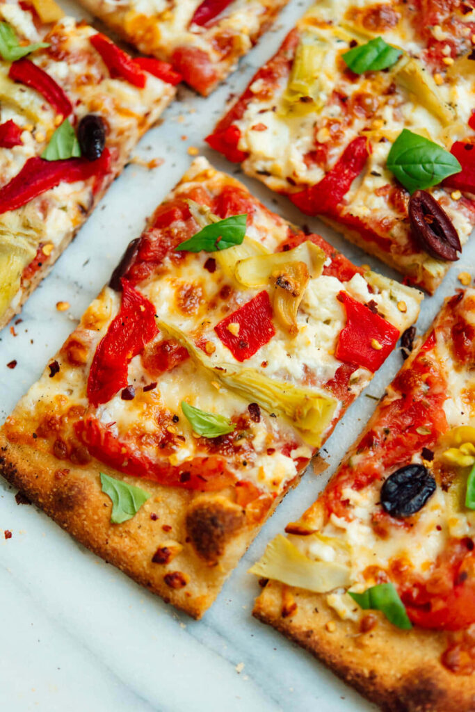 Vibrant Square Pizza Wallpaper: Colorful Toppings on Crispy Crust
