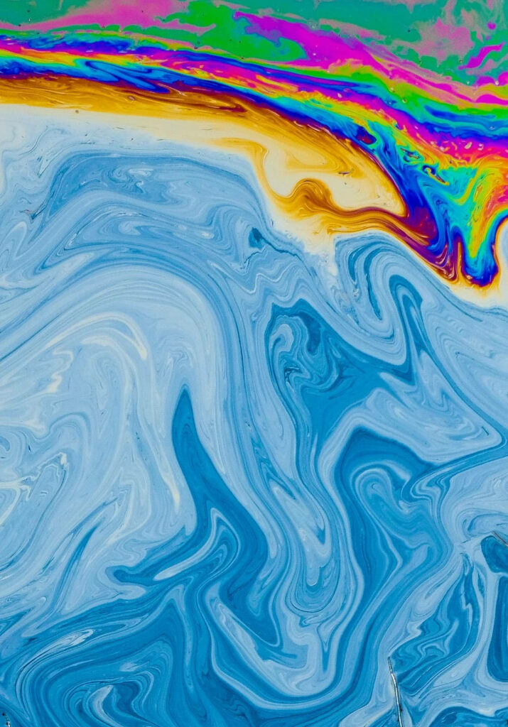 Vibrant Abstract Blue Wallpaper with Colorful Swirls & Marbled Effect