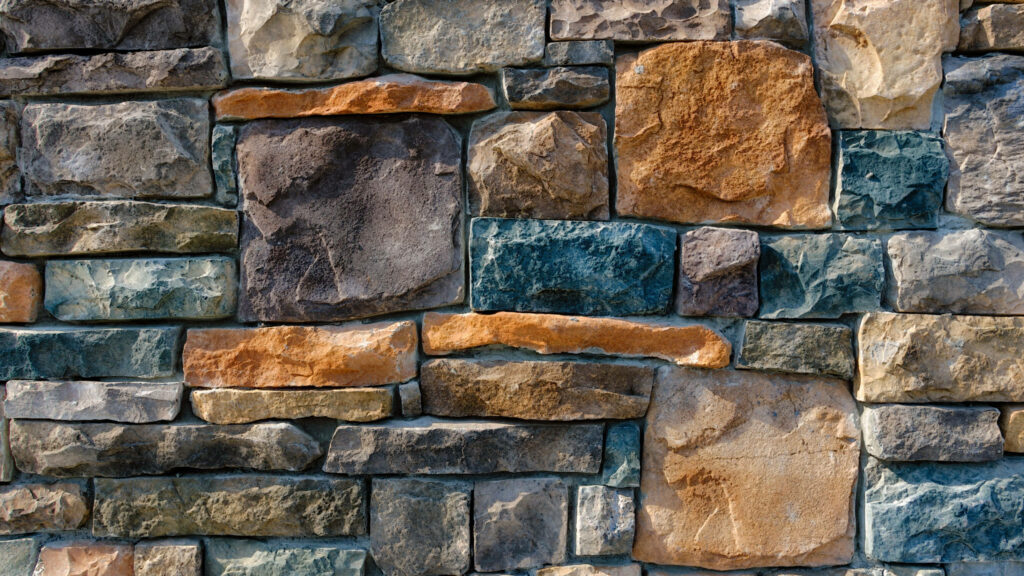 Colorful Textured Wallpaper Background of Rustic Stacked Stones