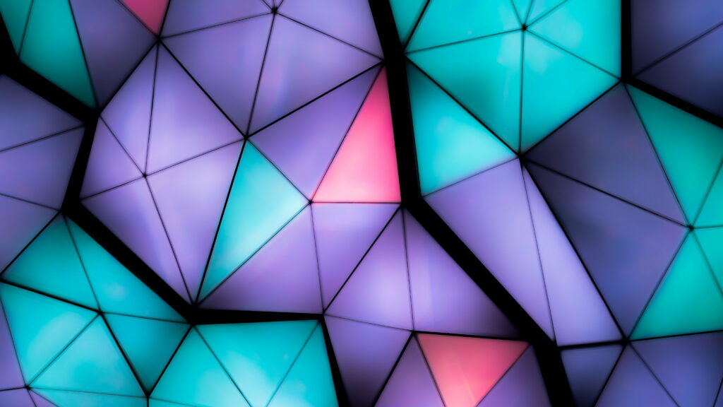 Colorful Triangular Fragments: Mesmerizing Backlit Volume in 6K Wallpaper Background