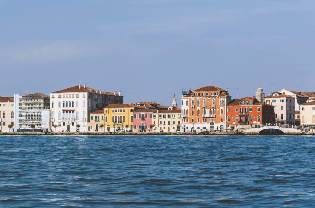 Colorful Venice Waterfront: Serene Historic Architecture Wallpaper