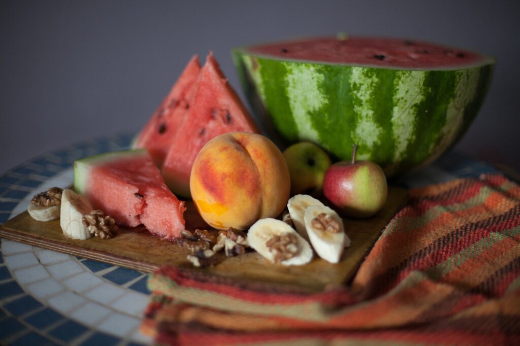 Colorful Fruit Wallpaper: Watermelon, Peach & More on Wood Surface