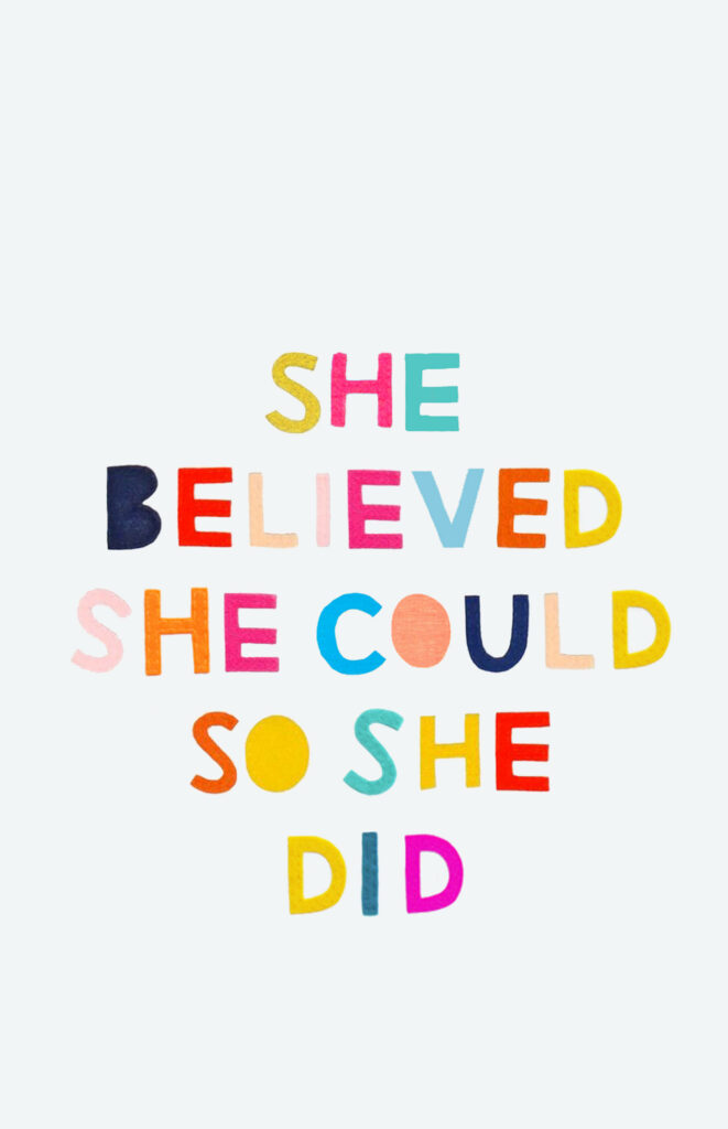 Vibrant Wallpaper: 'She Believed She Could' - Empowering Background