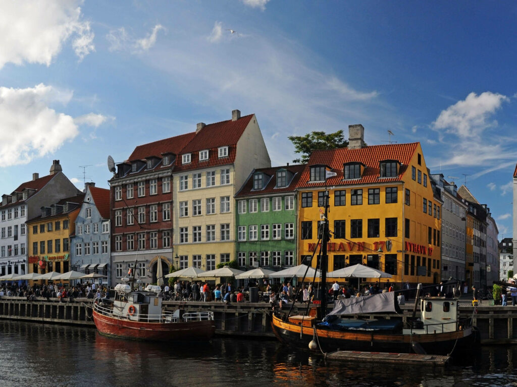 Colorful Copenhagen Waterfront: Vibrant Building & Boat Wallpaper