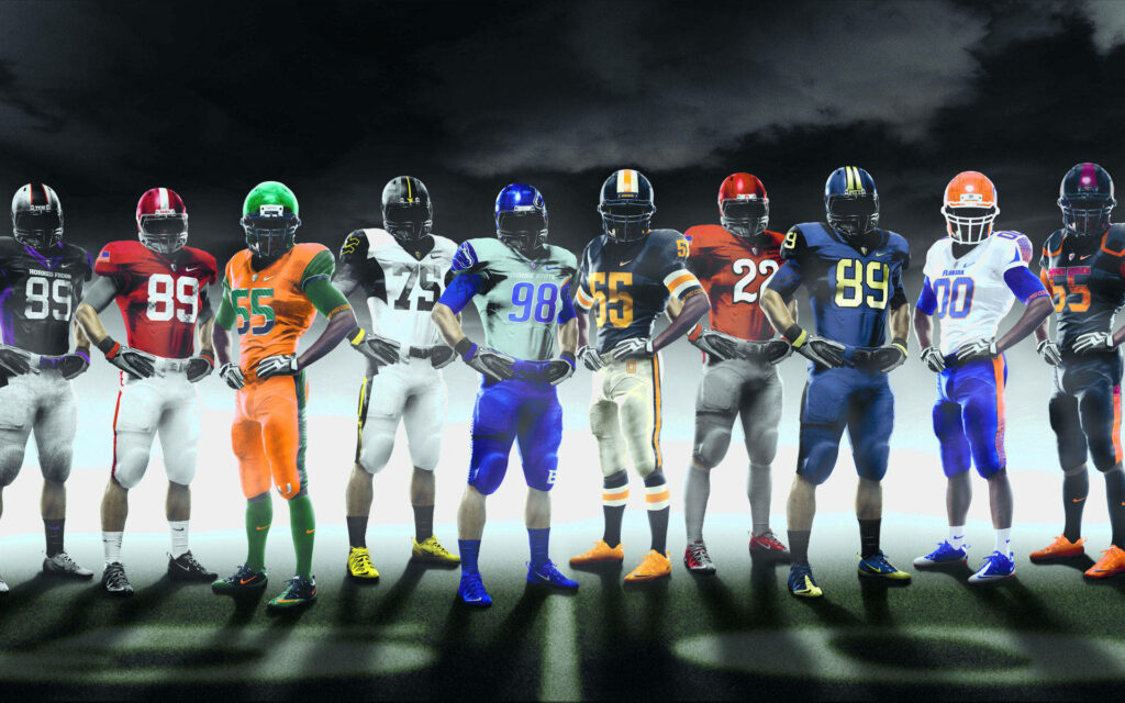 Colorful Clash: Captivating College Football Players Unite, Sporting Vibrant Uniforms Wallpaper