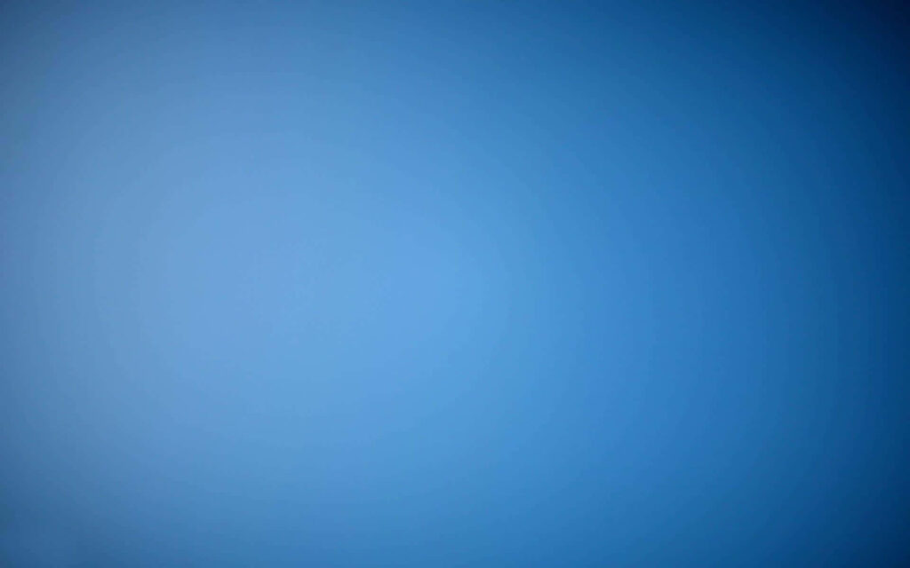 Splendid Blue Gradient Backdrop with Light Center and Dark Edges in Landscape Orientation Wallpaper