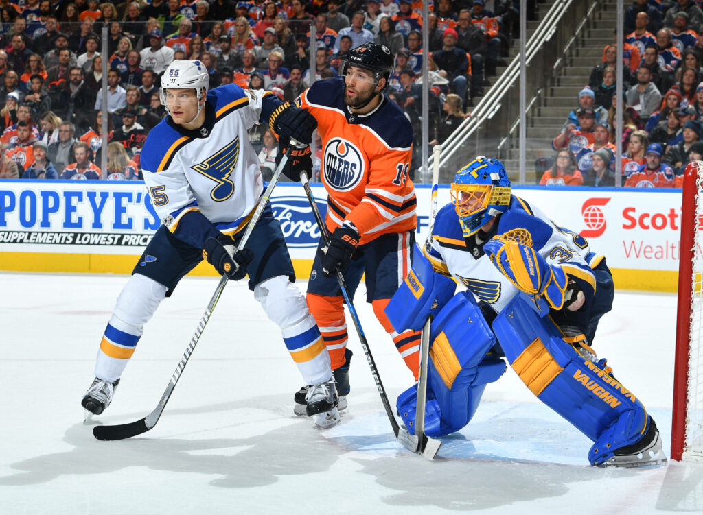 Dynamic Colton Parayko Hockey Action Wallpaper Background