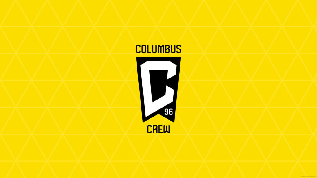 Columbus Crew logo wallpaper with bright yellow geometric background and bold black white crest