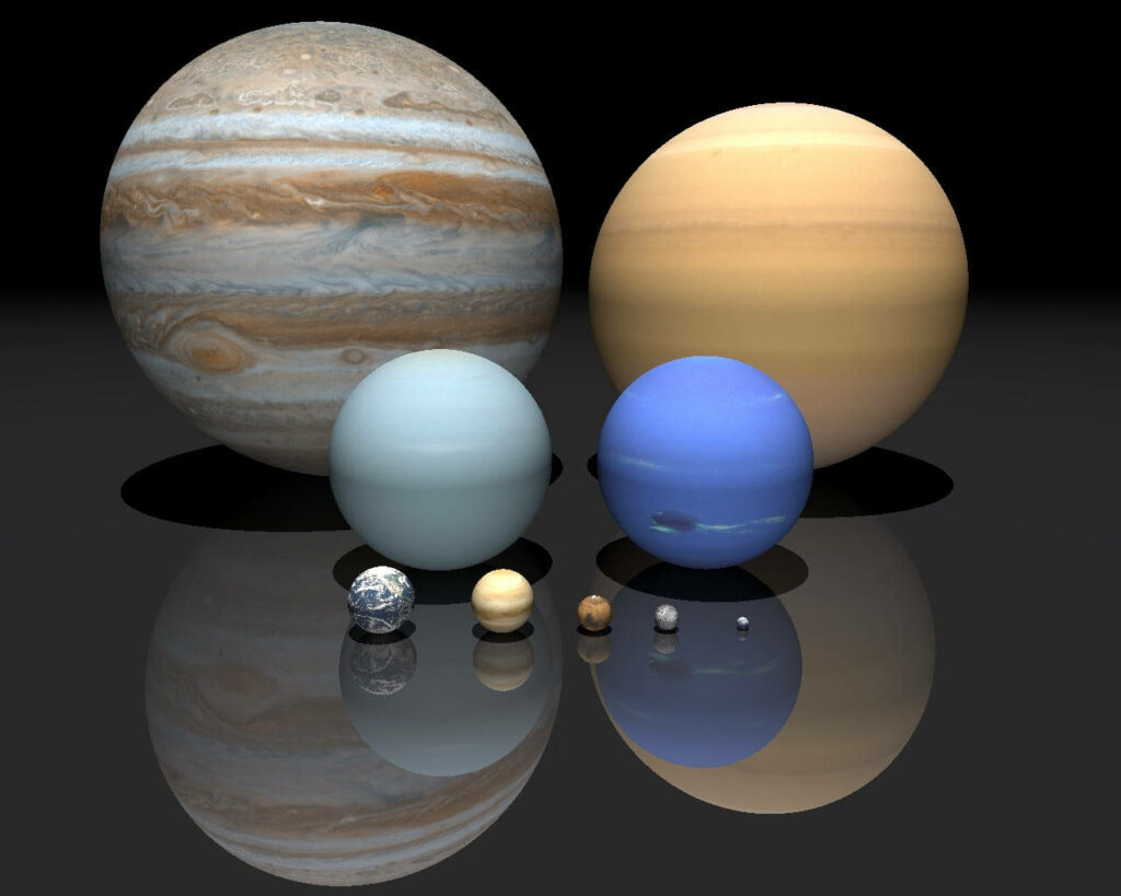 Pluto vs Earth: Size Comparison Wallpaper for Space Enthusiasts