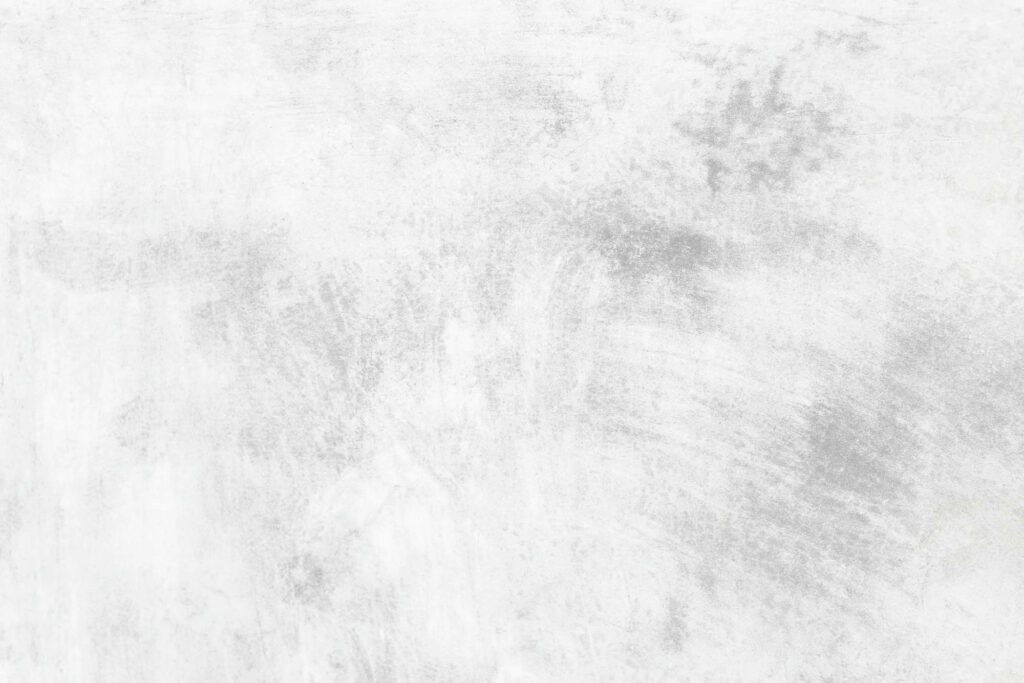 Concrete Poetry: Capturing the Textured Essence of a White Wall Wallpaper