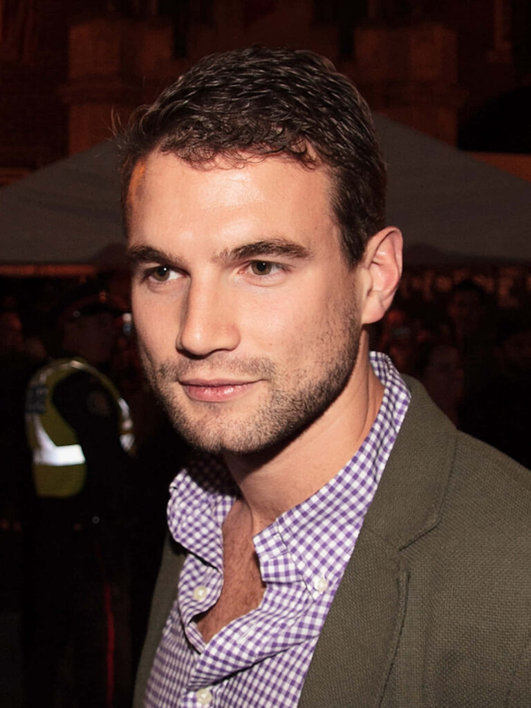 Alex Russell confident and stylish at event perfect wallpaper for fans background image