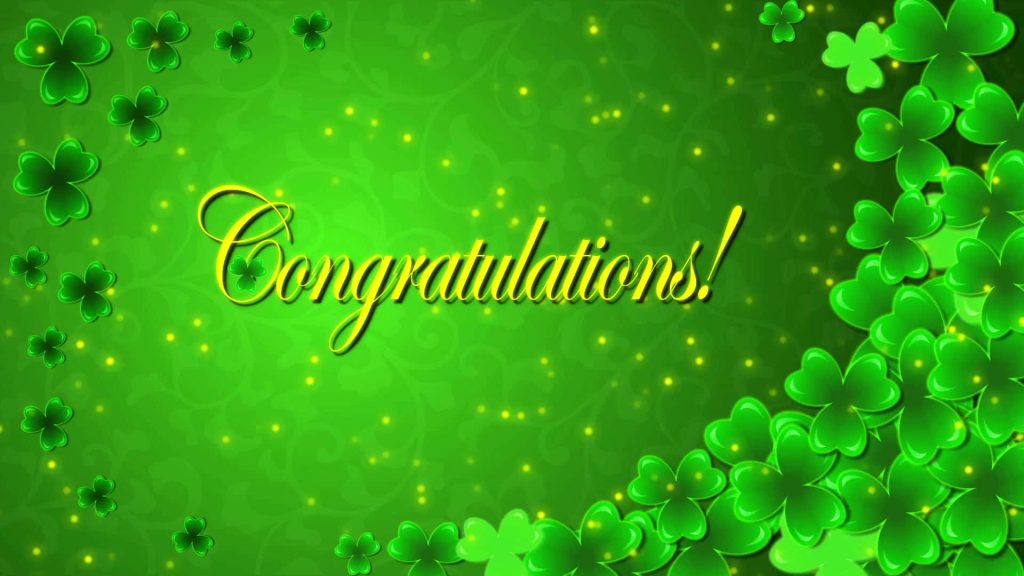 Gold Congratulations text with green shamrocks on glowing sparkling gradient background wallpaper