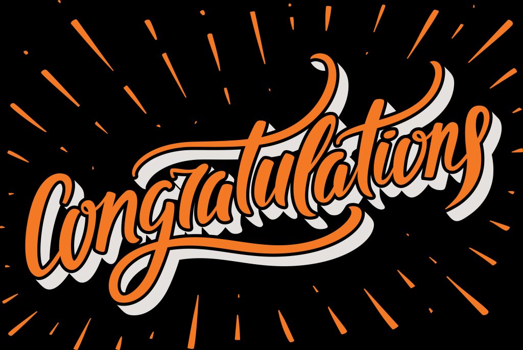 Congratulations text in orange cursive with sunburst on black background celebration wallpaper