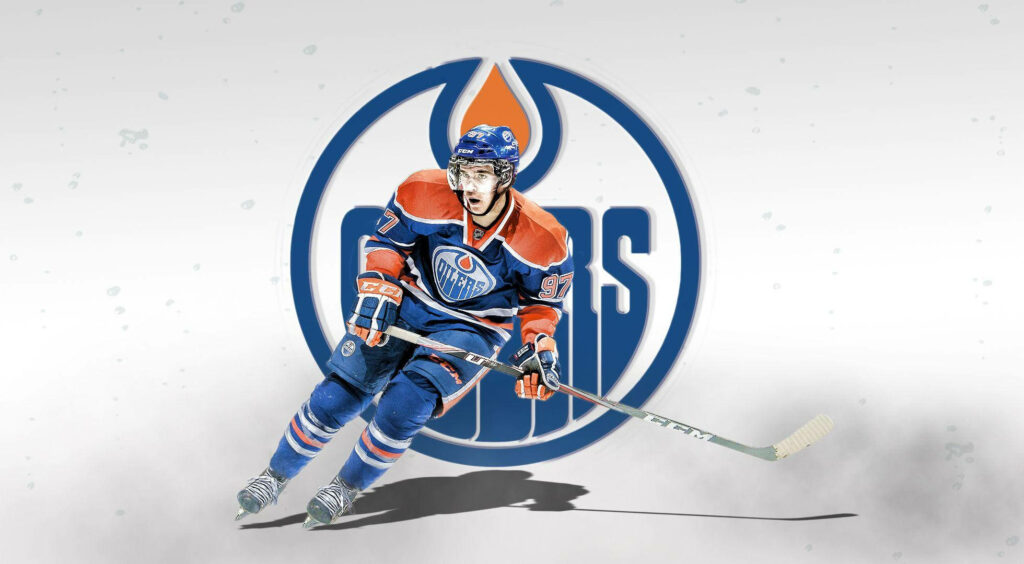 Connor McDavid Edmonton Oilers action wallpaper with bold logo and vibrant team colors background