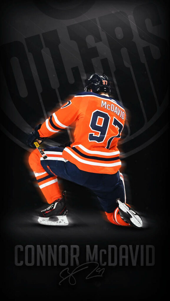 Connor McDavid Edmonton Oilers number 97 in orange blue jersey with team logo dynamic wallpaper