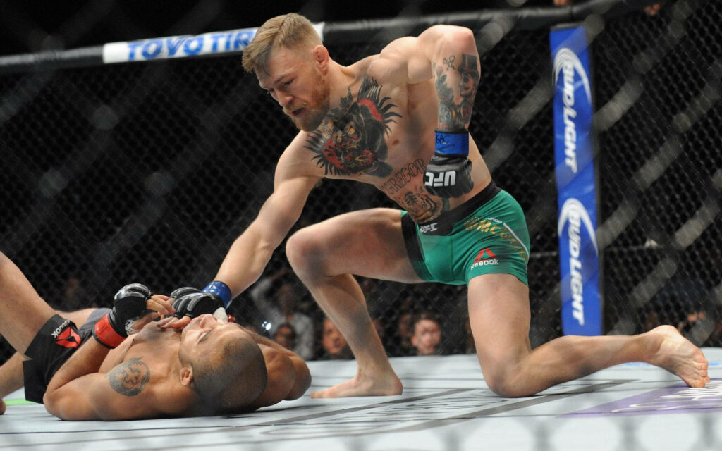 Conor McGregor Dominates José Aldo: UFC Fight Wallpaper Background