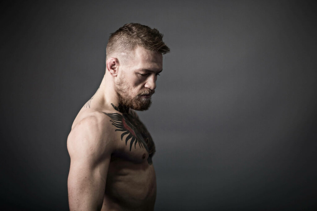 Conor McGregor Gray Wallpaper: Focused Martial Artist Minimalist Design