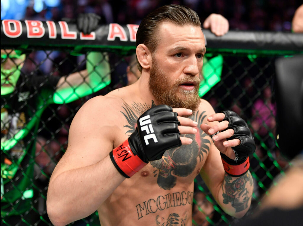 Conor McGregor UFC Cage Stance Wallpaper: Ready for Action
