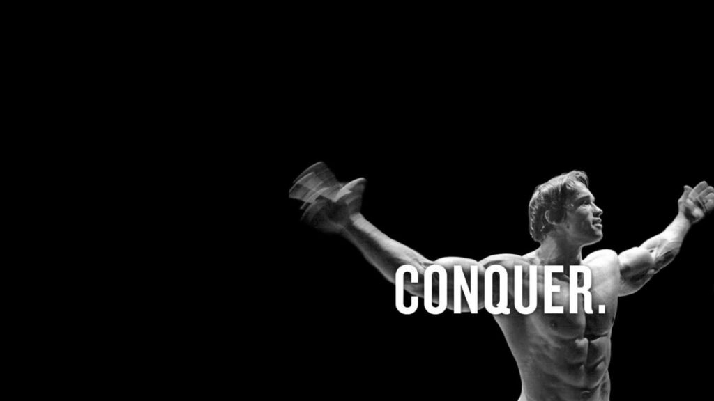 Triumphant Conquest: Inspiring HD Background Portraying a Man Celebrating Victory with Raised Hands Wallpaper