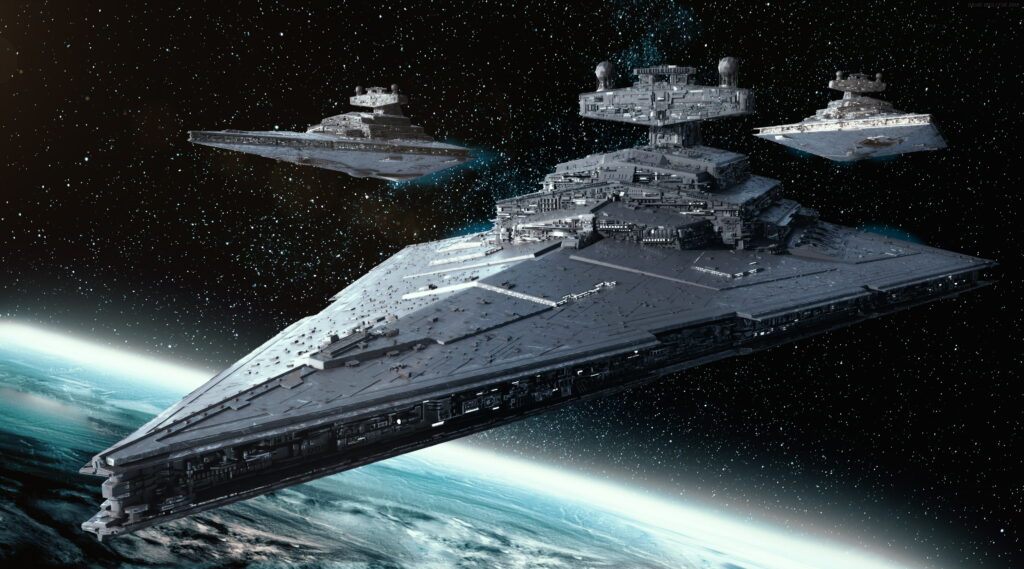 Epic Star Wars wallpaper of Imperial-class Star Destroyers above glowing planet in deep space