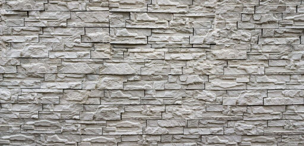 Brick Blockade: A Captivating 4K Wallpaper with a Straight Line Background Construction Scene