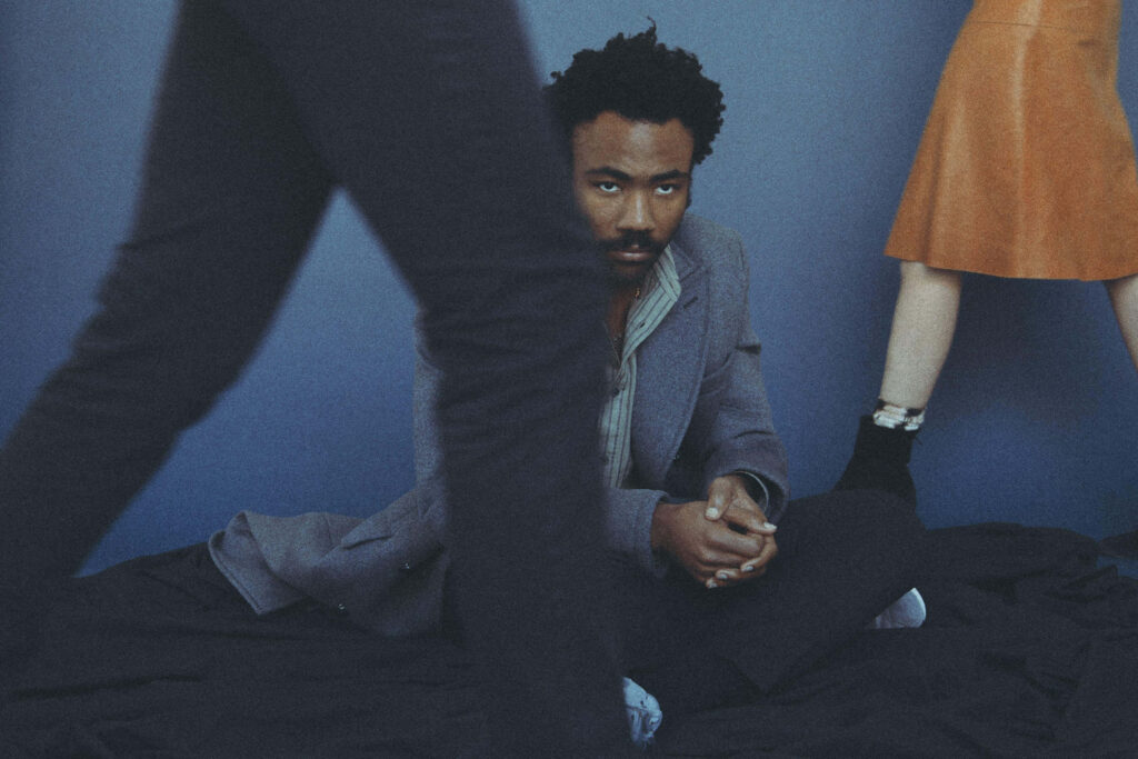 Contemplative Donald Glover: Thoughtful Pose Wallpaper Background