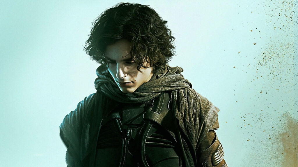 Paul Atreides Contemplative Wallpaper from Dune - Sandy Background