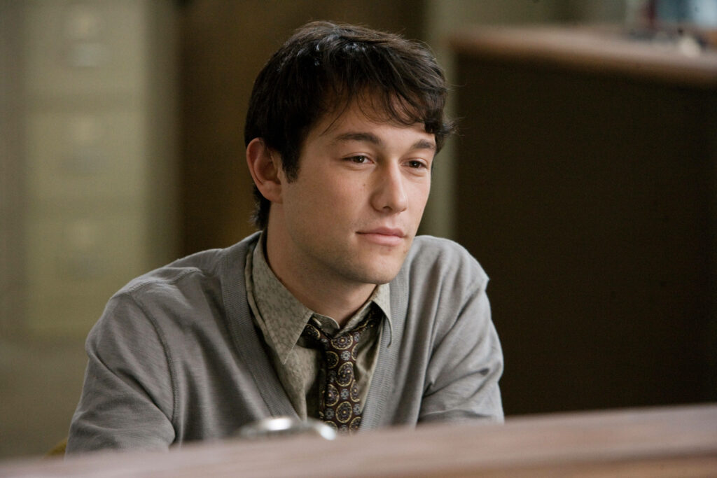 Contemplative Tom from 500 Days of Summer sitting at desk reflecting thoughtful mood wallpaper