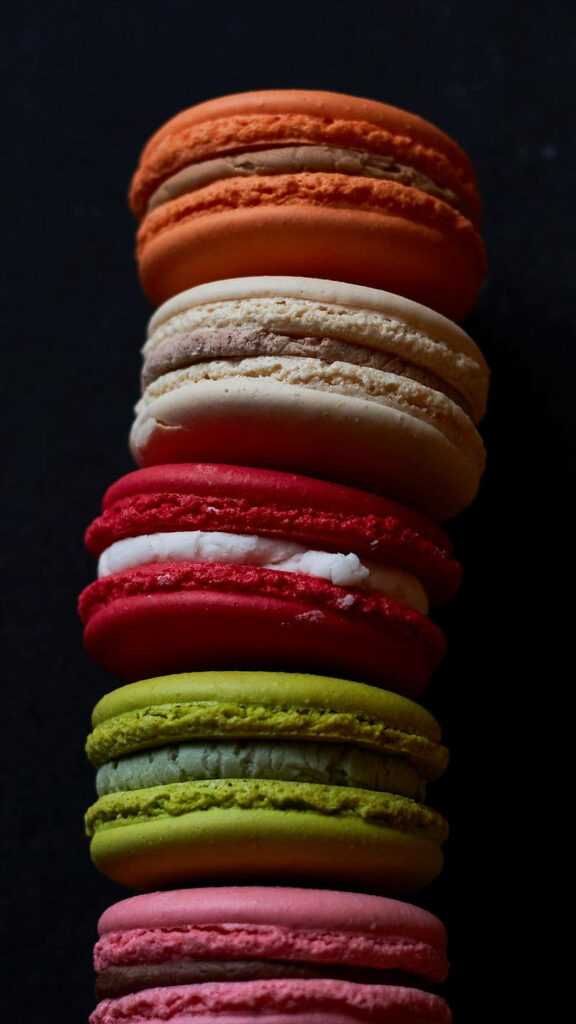 Sweet Temptations: Indulge in a Cookie Macaroon Extravaganza on Your iPhone Screen Wallpaper