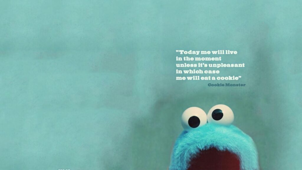 Cookie Monster wallpaper blue Sesame Street character playful quote on turquoise background